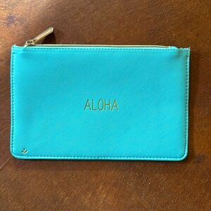 Flat travel / cosmetic bag. Mint green with “aloha” written in gold. 8.5”x5.5”